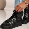 Anfibi alla moda in pelle artificiale Cores, nere