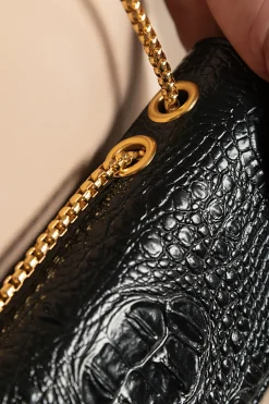 Borsa piccola con stampa pelle di coccodrillo, nera
