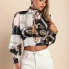Camicia elegante con collo alto e maniche a campana  Diezma, nero - rosa