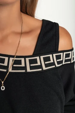 Completo elegante con top ampio e gonna attillata, nero