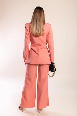 Completo giacca e pantaloni eleganti, colore salmone