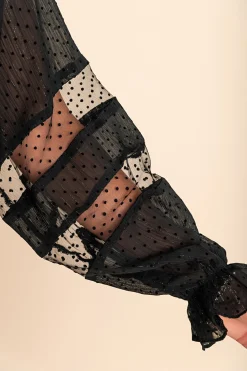 Elegante blusa in tessuto semitrasparente a pois Geltra, nera