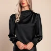 Elegante camicetta a collo alto, nera