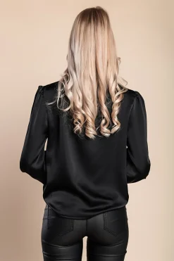 Elegante camicetta a collo alto, nera