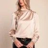 Elegante camicetta con collo alto, beige