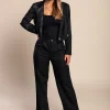 Elegante completo blazer e pantaloni a quadri, nero