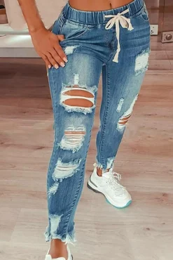 Jeans attillati a vita alta e spacchi Stefana, celeste
