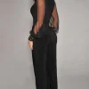 JUMPSUIT ELEGANTE CON SCOLLO A "V" E MANICHE TRASPARENTI CON RIVETTI GEORGINA, NERO