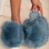 Pantofole con pelliccia artificiale, di colore azzurro