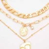 Set di tre collane con pendenti, ART581, colore oro