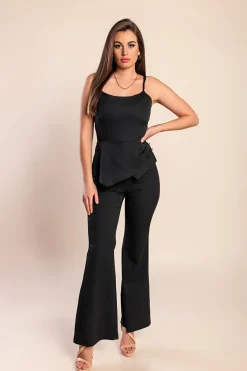 Tuta elegante con bottoni decorativi, nera